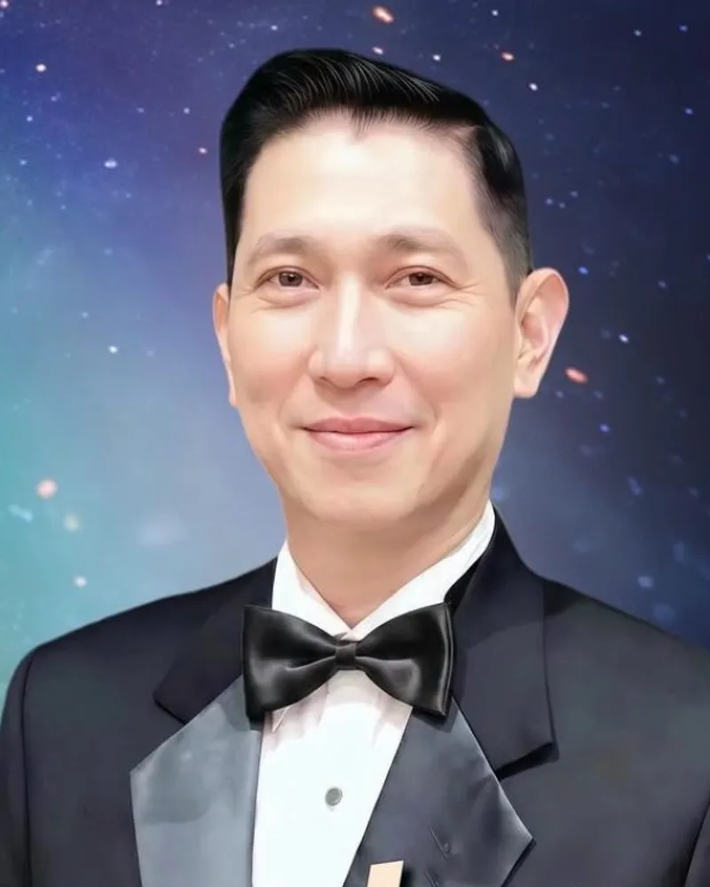 JOHN TAN